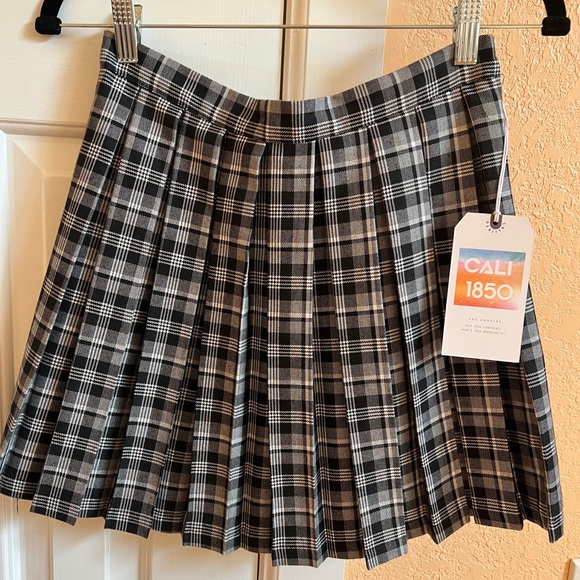 Dresses & Skirts - Cali1850 Blank and White Plaid Pleated Mini Skirt